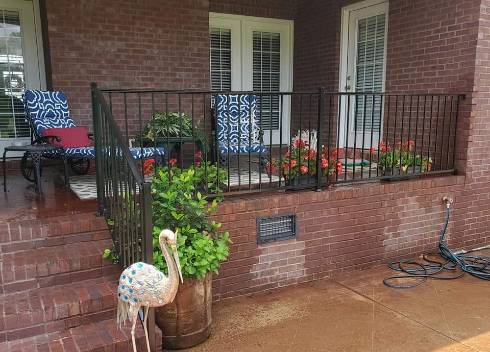Black aluminum ornamental fence panel installed at a North Alabama property